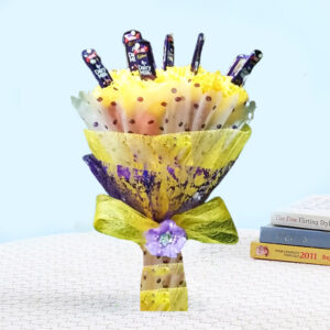 A delightful assortment of 15 pieces of Cadbury Dairy Milk Chocolates (13.2g each), presented in yellow and purple non-woven paper packing, wrapped with white polka dots paper, and tied with a yellow ribbon bow for an elegant finish.