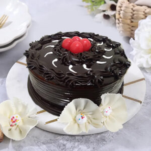 Indulge in our creamy Chocolate Truffle Cake available in round shape and weights of half kg, 1 kg, or 2 kg.