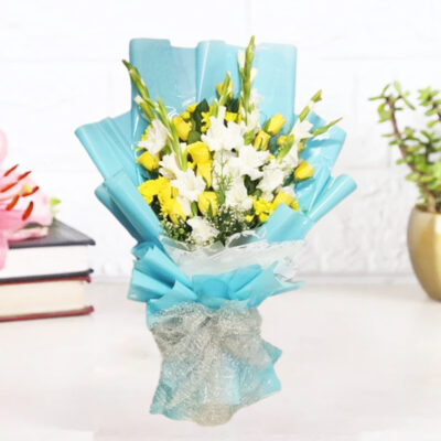 An exquisite bouquet featuring 16 Yellow Roses, 6 White Gladiola, lush Green Fillers, wrapped in Blue and White paper, adorned with a Silver net Ribbon.