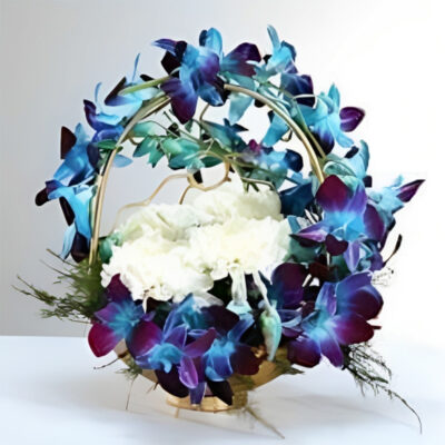 blue orchids and white carnations basket