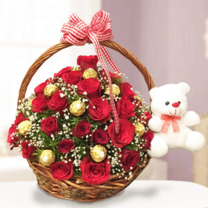 50 red roses accompanied by 16 indulgent Ferrero Rocher chocolates, elegantly arranged with the delicate touch of white flower gypsy green fillers.