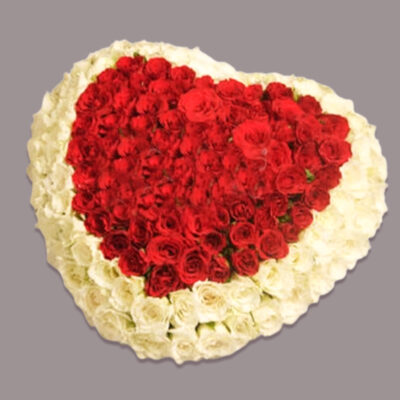 75 white roses and 75 red roses elegantly arranged in a heart-shaped basket. This stunning ensemble is a timeless expression of love and elegance, perfect for grand celebrations, weddings, or any occasion where you want to make a statement of affection.