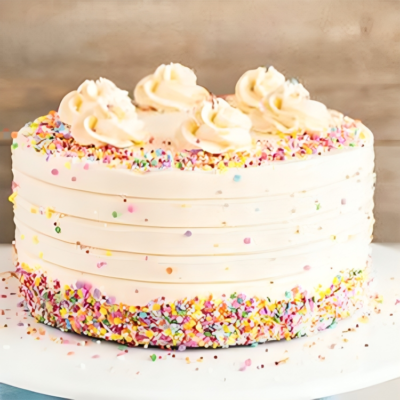 our Vanilla cream cake, available in half kg, 1 kg, or 2 kg sizes. Crafted with care, this round-shaped cake is a delightful blend of moist vanilla sponge cake and creamy frosting, perfect for any occasion.